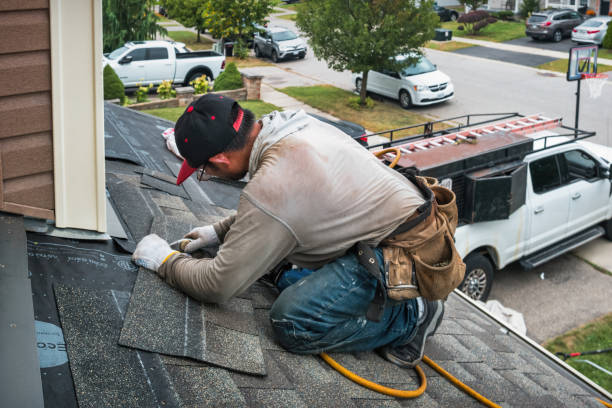 Professional Roofing technician working in Woodland Hills, CA